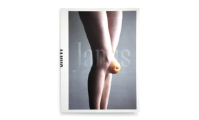 Book cover featuring photograph of legs wearing light tights, with a peach at the knee.
