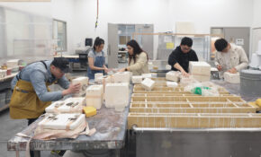 Students work on projects in ECU's ceramics studio.