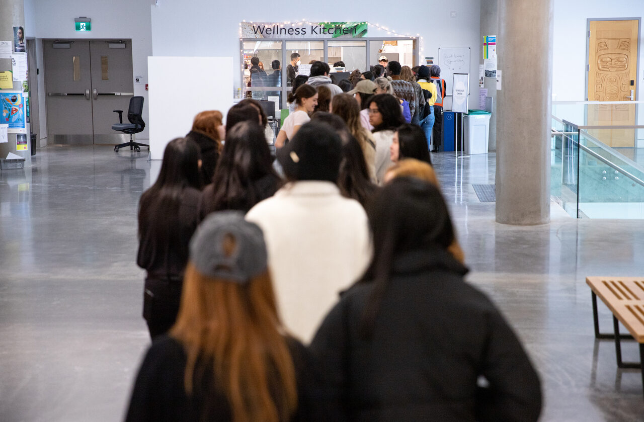 Students lined up at the Wellness Kitchen