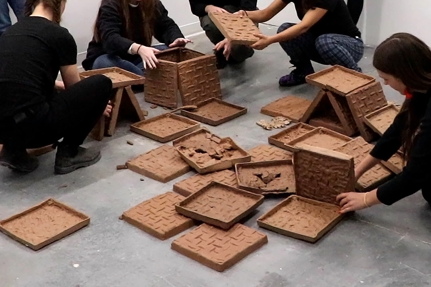 Pick Up a Tile Anna Luth 2020 Performance documentation including 49 unfired clay tiles and viewer participation