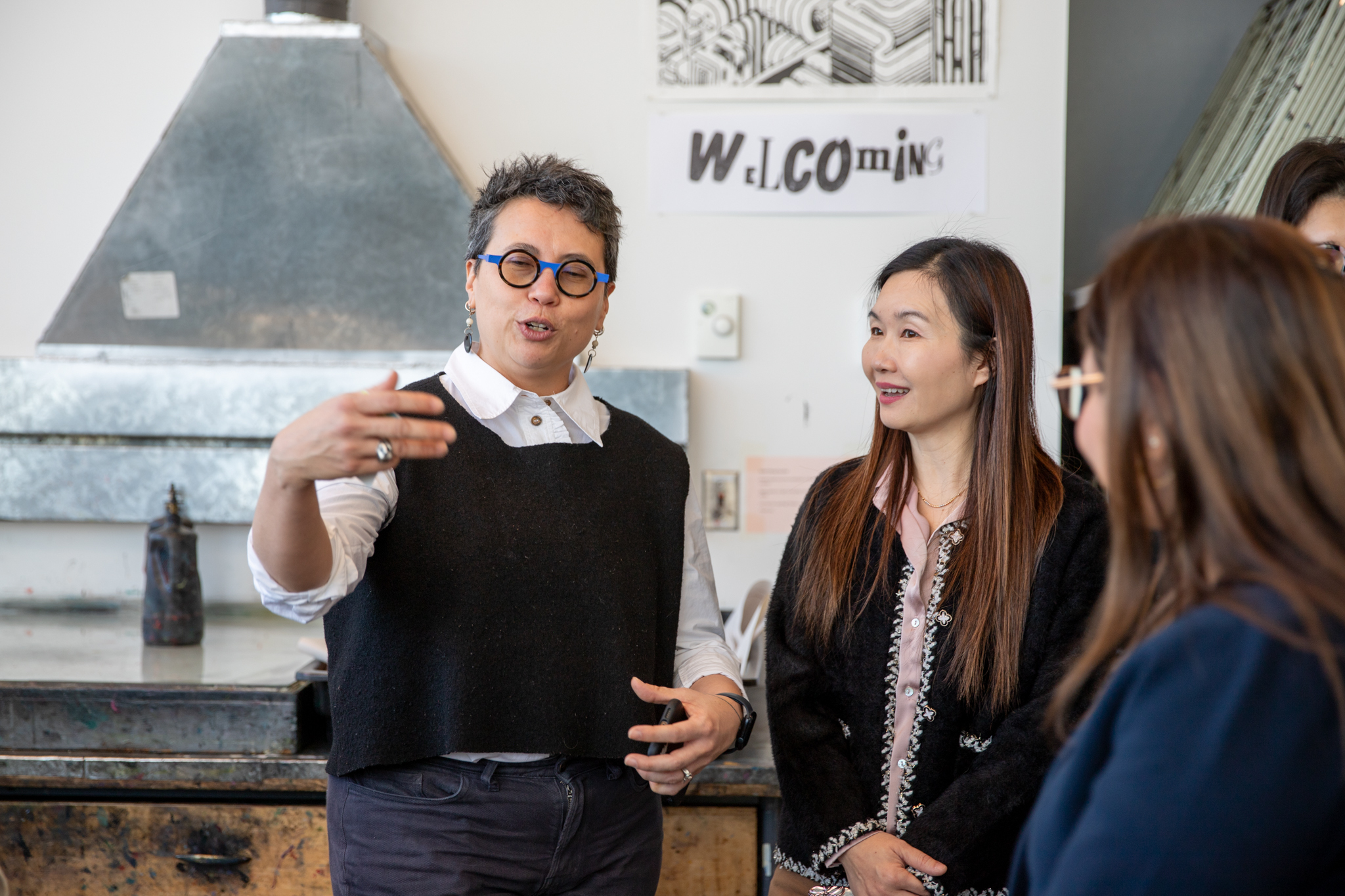 Interim Vice-President Academic + Provost Diyan Achjadi speaks to Honourable Anne Kang, Minister, Post-Secondary Education and Future Skills and Sunita Dhir, Parliamentary Secretary for International Credentials in the Print Media Studio