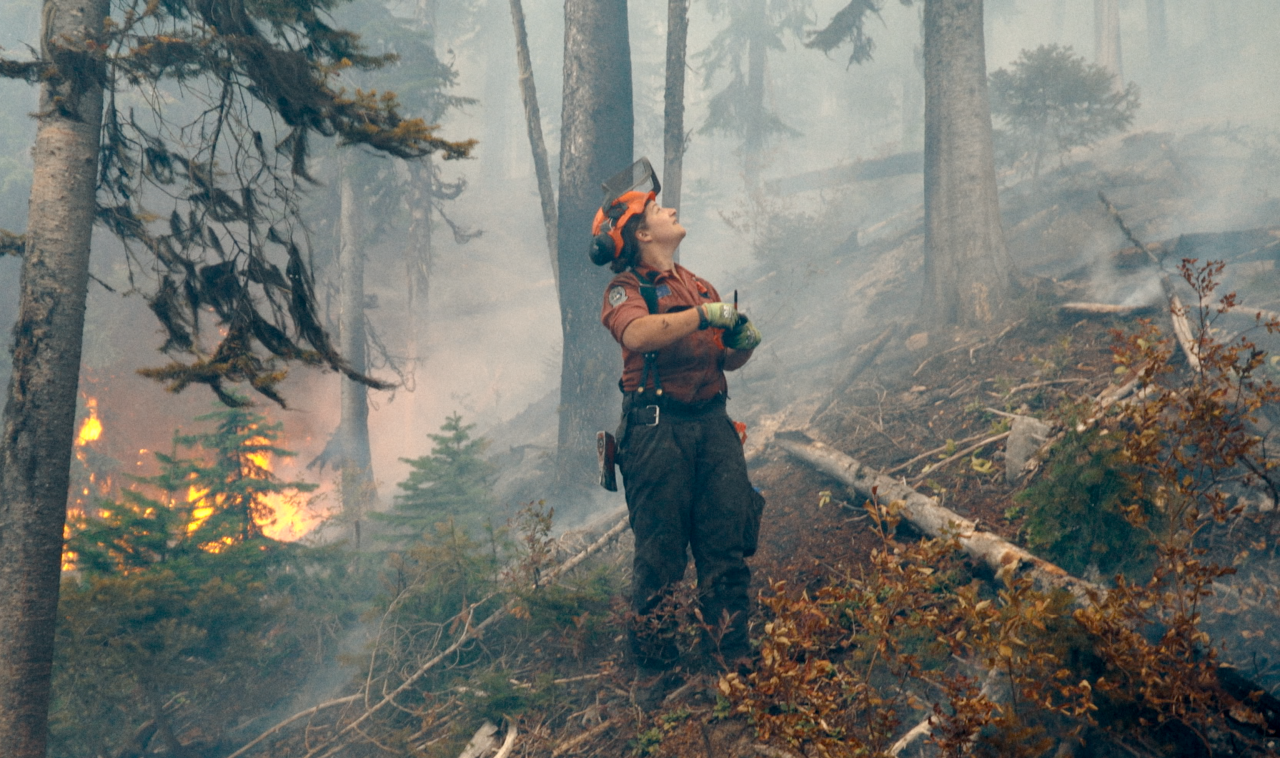 Wildfire Ep1 Danger tree faller Laurence Bachand watches for a helicopter Photo courtesy CK9 Studios Optic Nerve Films